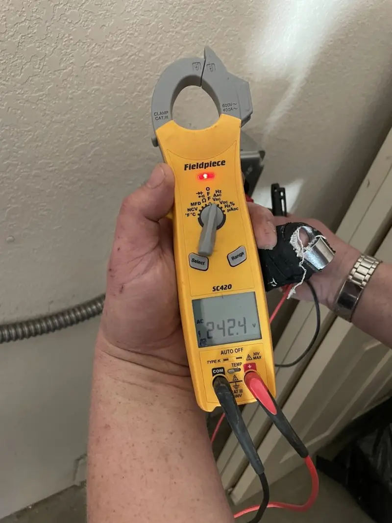 Voltage testing with clamp meter during Electrical Installation Services in Park Hills